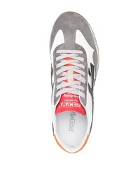 Chaussures de sport blanches et noires Premiata