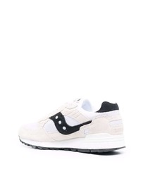 Chaussures de sport blanches et noires Saucony