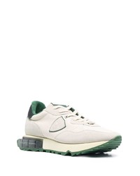 Chaussures de sport blanches et noires Philippe Model Paris