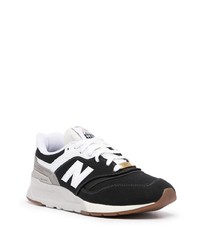 Chaussures de sport blanches et noires New Balance