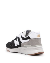 Chaussures de sport blanches et noires New Balance