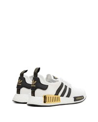 Chaussures de sport blanches et noires adidas