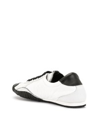 Chaussures de sport blanches et noires N°21