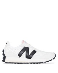 Chaussures de sport blanches et noires New Balance