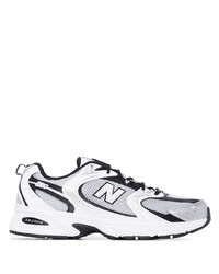 Chaussures de sport blanches et noires New Balance