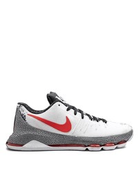 Chaussures de sport blanches et noires Nike