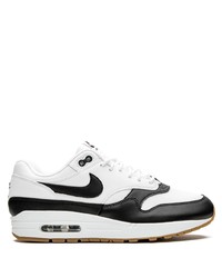 Chaussures de sport blanches et noires Nike