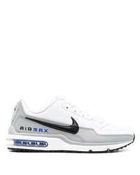 Chaussures de sport blanches et noires Nike