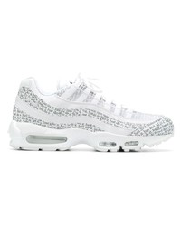 Chaussures de sport blanches et noires Nike