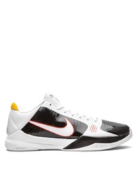 Chaussures de sport blanches et noires Nike