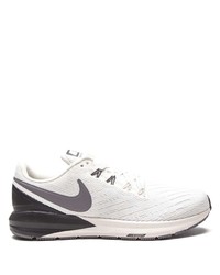 Chaussures de sport blanches et noires Nike