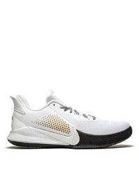 Chaussures de sport blanches et noires Nike