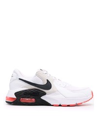 Chaussures de sport blanches et noires Nike