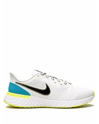 Chaussures de sport blanches et noires Nike