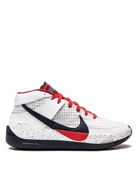 Chaussures de sport blanches et noires Nike