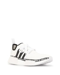 Chaussures de sport blanches et noires adidas