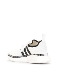 Chaussures de sport blanches et noires adidas