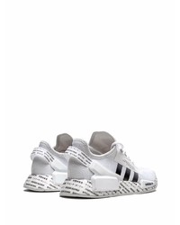 Chaussures de sport blanches et noires adidas