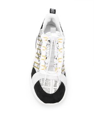 Chaussures de sport blanches et noires John Galliano