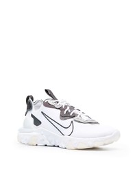 Chaussures de sport blanches et noires Nike