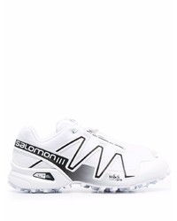 Chaussures de sport blanches et noires Salomon S/Lab