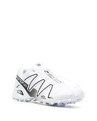 Chaussures de sport blanches et noires Salomon S/Lab