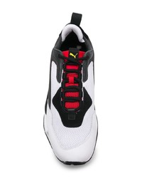 Chaussures de sport blanches et noires Puma