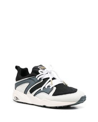 Chaussures de sport blanches et noires Puma