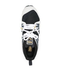 Chaussures de sport blanches et noires Puma