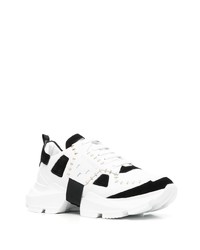 Chaussures de sport blanches et noires Les Hommes