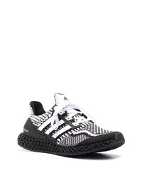 Chaussures de sport blanches et noires adidas