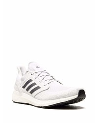 Chaussures de sport blanches et noires adidas