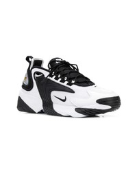 Chaussures de sport blanches et noires Nike