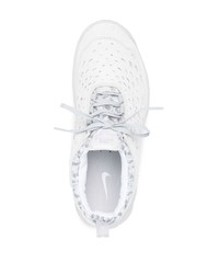 Chaussures de sport blanches Nike