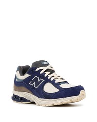 Chaussures de sport bleu marine et blanc New Balance