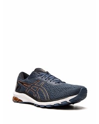 Chaussures de sport bleu marine et blanc Asics