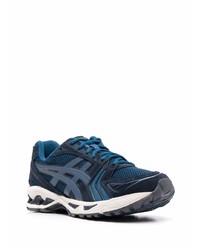 Chaussures de sport bleu marine et blanc Asics