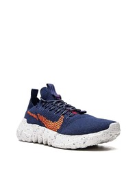 Chaussures de sport bleu marine et blanc Nike