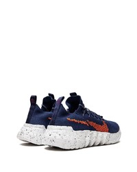 Chaussures de sport bleu marine et blanc Nike