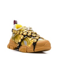 Chaussures de sport dorées Gucci