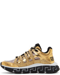 Chaussures de sport dorées Versace