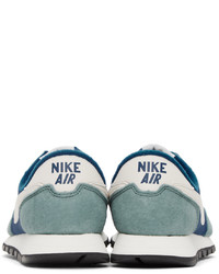 Chaussures de sport en cuir blanc et bleu Nike