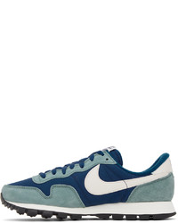 Chaussures de sport en cuir blanc et bleu Nike