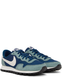 Chaussures de sport en cuir blanc et bleu Nike