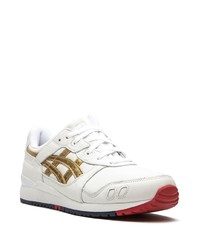 Chaussures de sport en cuir blanches Asics