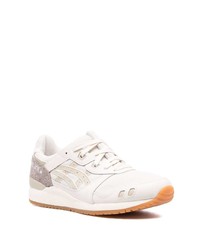 Chaussures de sport en cuir blanches Asics