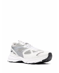 Chaussures de sport en cuir blanches Axel Arigato