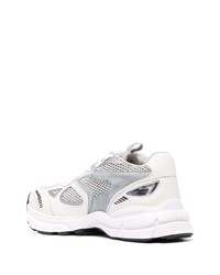 Chaussures de sport en cuir blanches Axel Arigato