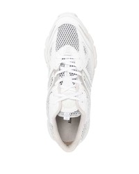 Chaussures de sport en cuir blanches Axel Arigato