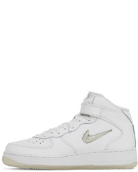 Chaussures de sport en cuir blanches Nike